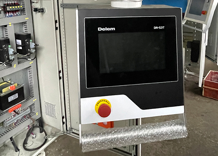 CNC press brake control panel with touchscreen programming interface